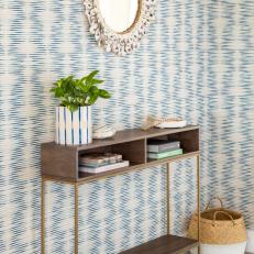 Console Table and Blue Striped Wallpaper