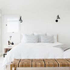 White Main Bedroom With Woven Bench