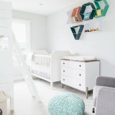 Transitional Kids Room and Nursery With Blue Pouf