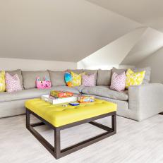 Attic Sitting Area With Yellow Ottoman