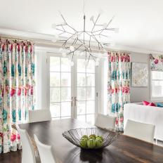 Contemporary Dining Area With Blue and Pink Curtains