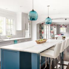 Open Plan Kitchen With Blue Glass Pendants