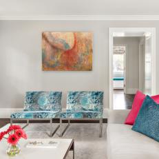 Contemporary Family Room With Teal Chairs