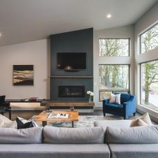 Neutral Contemporary Living Room With Blue Armchair