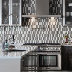 Gray Chef Kitchen With Mosaic Backsplash