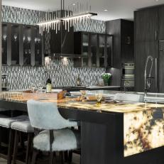 Gray Chef Kitchen With Onyx Countertop