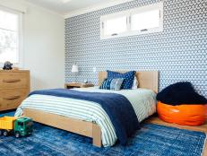 Blue Kid's Room With Orange Beanbag