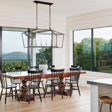 Contemporary Dining Room With Treetop View