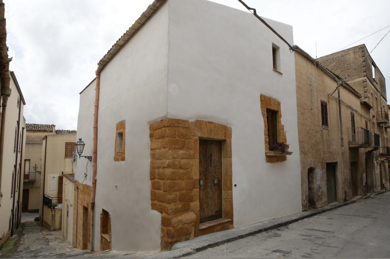 New plaster was added to the exterior of Lorraine Bracco's historic Sicilian house, as seen on HGTV's My Big Italian Adventure.