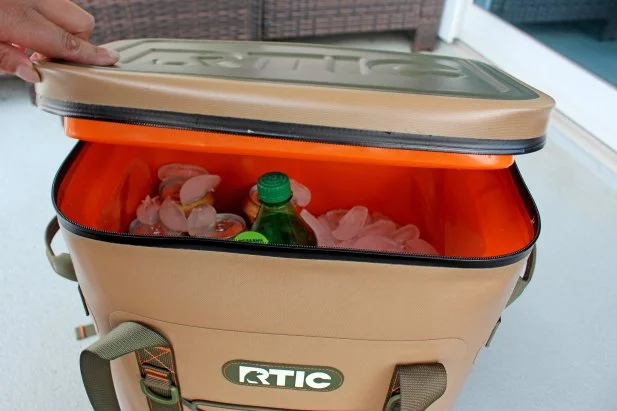 The RTIC Backpack Cooler features a &quot;top-loading&quot; lid design, much to that of a traditional cooler. This means more room for beverages inside and extra insulation padding around the zipper area.