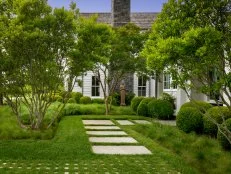 Lushes Green Landscaping With Embedded Stone Pavers
