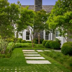 Gorgeous Natural Stone Pavers Embedded in Lushes Green Grass