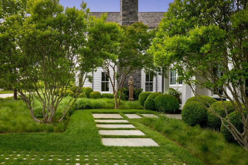 Lushes Green Landscaping With Embedded Stone Pavers