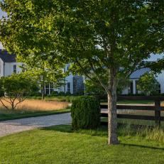 Beautiful White Farmhouse With Black Wooden Fence