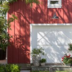 Red Board and Batten Barn With Contrasting White Doors
