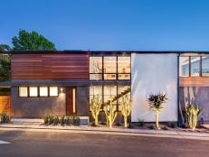 Contemporary Corner Lot Home Features Wood and Concrete Features
