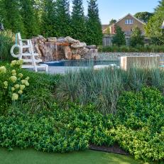 Water Features and Mature Landscaping in Beautiful Backyard Remodel