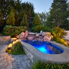 Sizable Stone Hot Tub with Boulder Water Feature