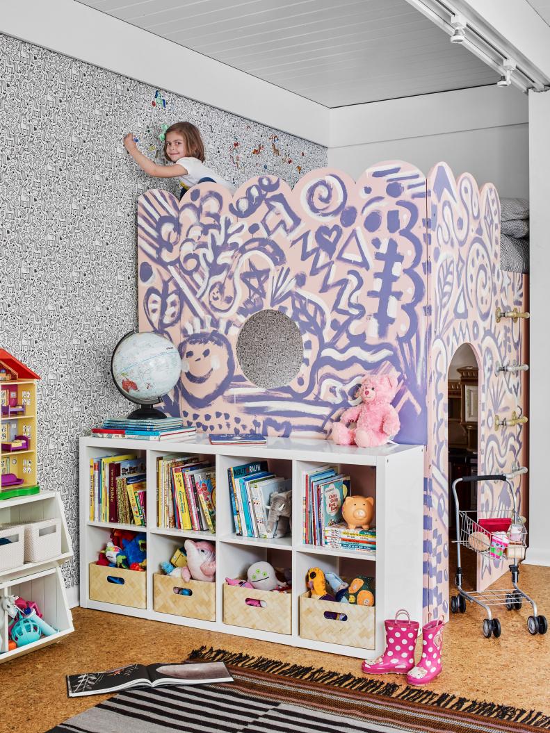 This children's room features wallpaper that can be colored in.