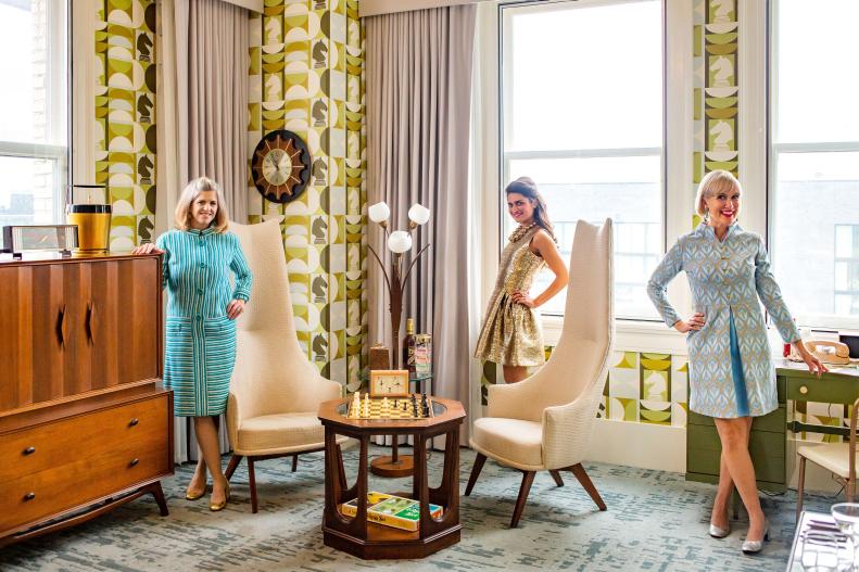 Lexington, Kentucky-based interior designer Isabel Ladd (center) is the design mastermind behind the "Harmon Room," a witty, detail-oriented homage to the hit Netflix show "The Queen's Gambit" at the 21c Museum Hotel in Lexington. Guests can book a stay at the midcentury modern maximalist space through May. On the right is Mid-Century Design League of Lexington founder Lucy Jones, who loaned much of the furniture from her personal collection to the hotel and on the left is Alex K Mason of Ferrick Mason Inc. who designed the signature wallpaper for the room (which may be available to the public as soon as Spring 2021).
