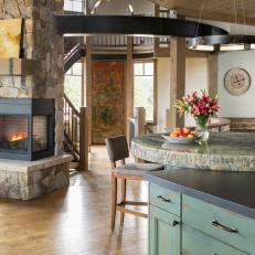 Rustic Open Plan Kitchen With Fireplace