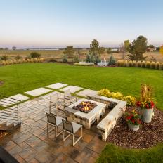 Cozy Firepit and Gorgeous Plantings for New Backyard