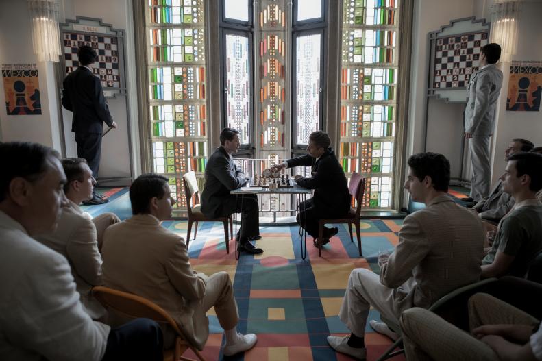A scene from the Netflix show "The Queen's Gambit" shows the vintage use of color and pattern that gives the series set from the late Fifties to the late Sixties its distinctive look.