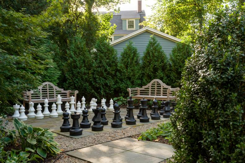 Outdoor Chessboard Surrounded By Arborvitae