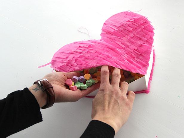 Fill the heart with candy and seal up the opening using a hot glue gun.