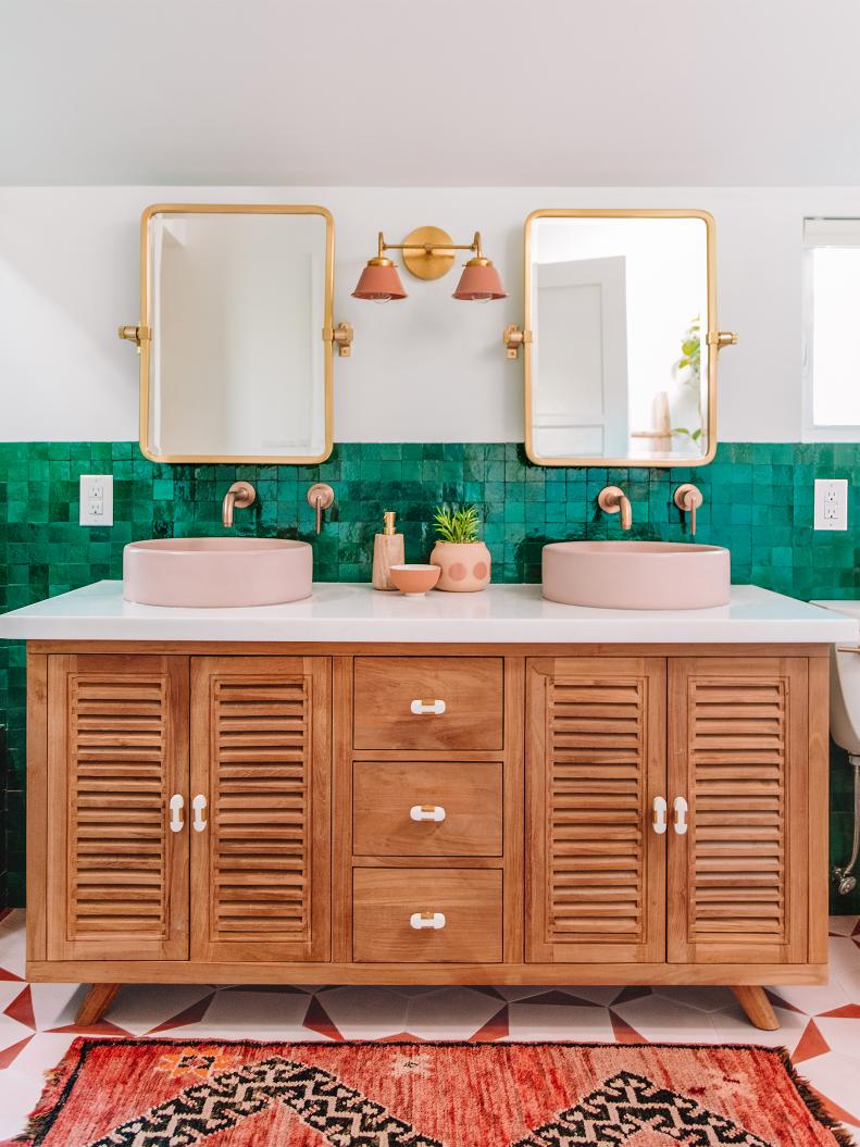 The unofficial term for pairing a wood vanity with rich colors and texture? Ooh la loo! L.A. blogger Kelly Mindell of Studio DIY poshed hers up with shimmery green terra-cotta tile, matte pink concrete sinks from Nood Co., and gleaming accents. “There’s no reason even the most utilitarian items can’t be special,” she says.