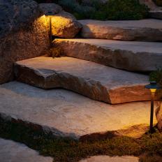 Stacked Stone Staircase with Lighting