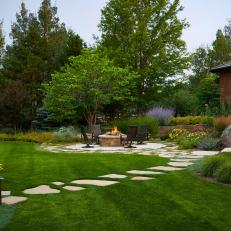Expansive Garden with Firepit Patio