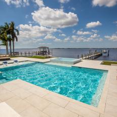 Beautiful Bayside Pool With Expansive Paver Patio and Hot Tub