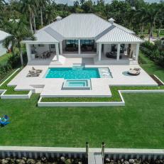 Immaculate Backyard With Waterfront Swimming Pool 