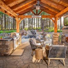 Grand Covered Patio With Rustic Flair