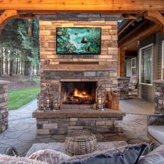 Rustic Outdoor Fireplace and Media Center