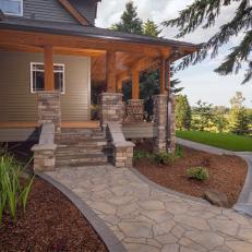 Wrap-Around Front Porch With Stone Walkway