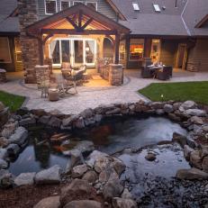 Rustic Backyard With Koi Pond Feature