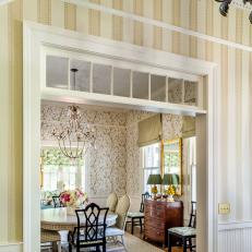 Traditional Dining Room With Cased Opening and Transom