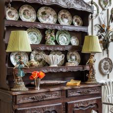 Dark Antique French Cabinet With Traditional Porcelain Collection and Lamps 