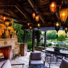 Mediterranean Covered Patio With Pendants