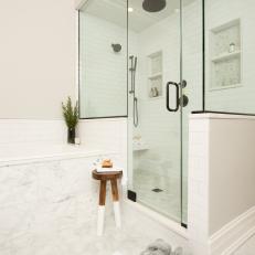 Tub and Walk In Shower With Wood Stool
