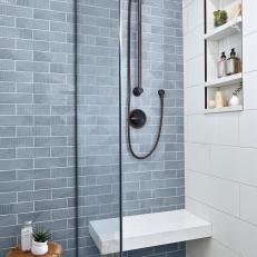 Shower With Blue Textured Tile Backsplash
