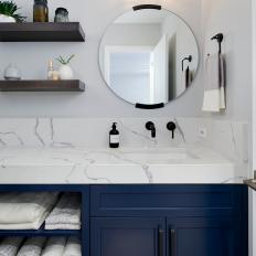 Powder Room With Blue Vanity
