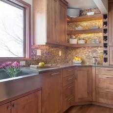 Brown Craftsman Kitchen With Yellow Backsplash