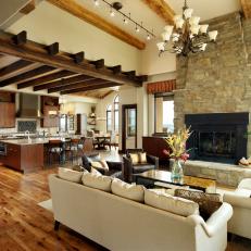 Mediterranean Neutral Great Room With Exposed Beams