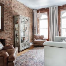 Living Room With Exposed Brick Wall