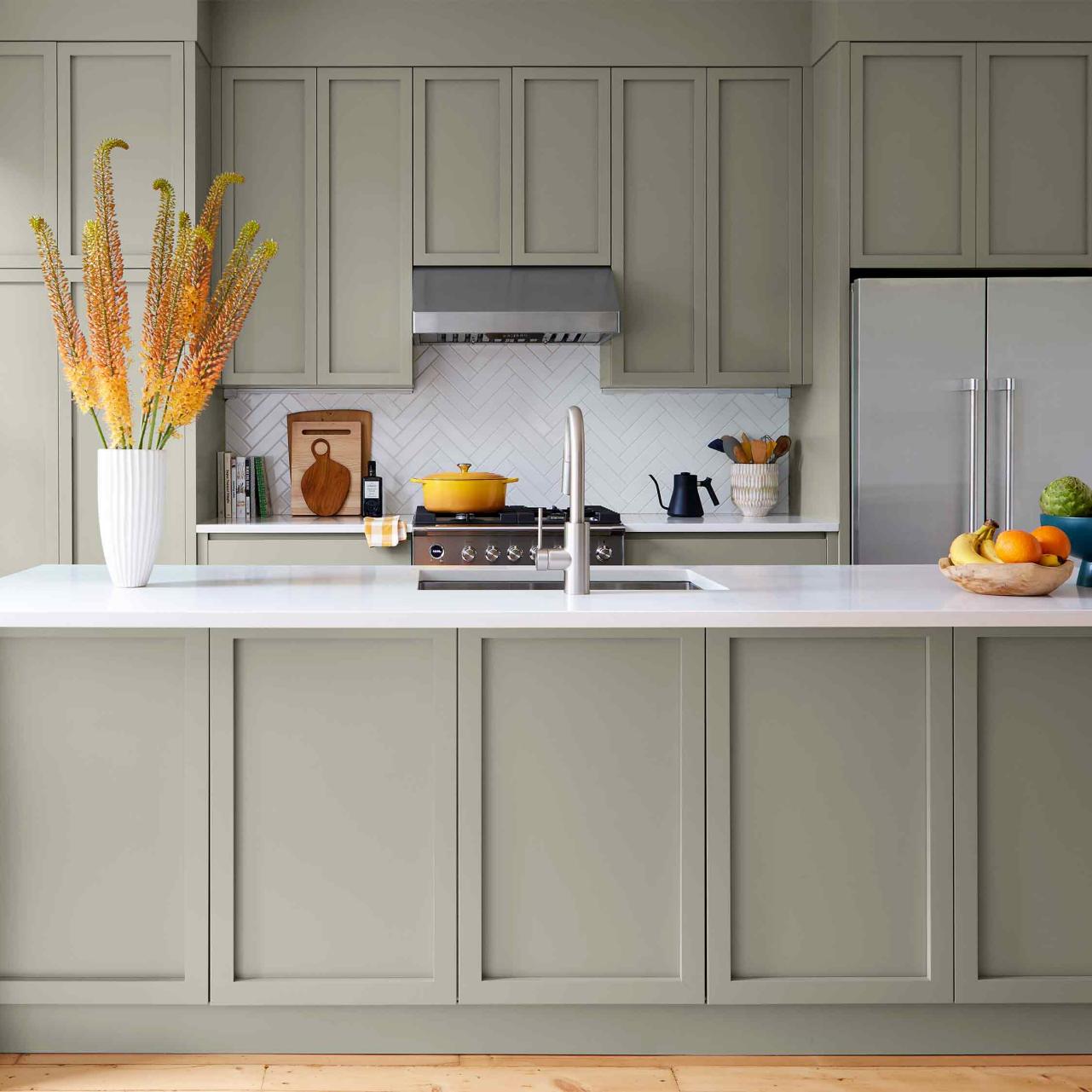 10 ways interior designers work color into neutral kitchens