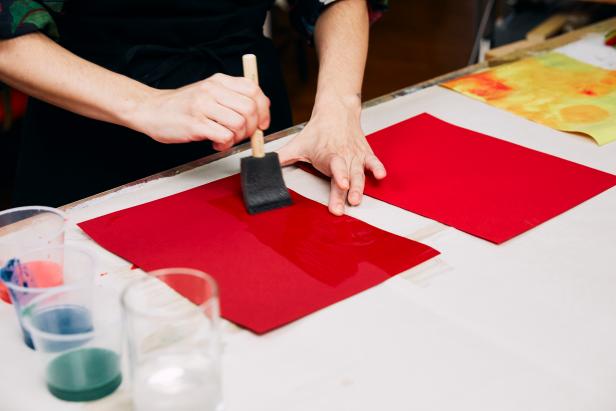 Once the colors are diluted, take a clean foam brush and paint water quickly across the paper horizontally. Tip: You don’t want the paper to peel up.