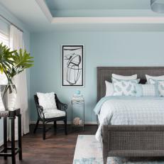 Blue Coastal Bedroom With Woven Bed